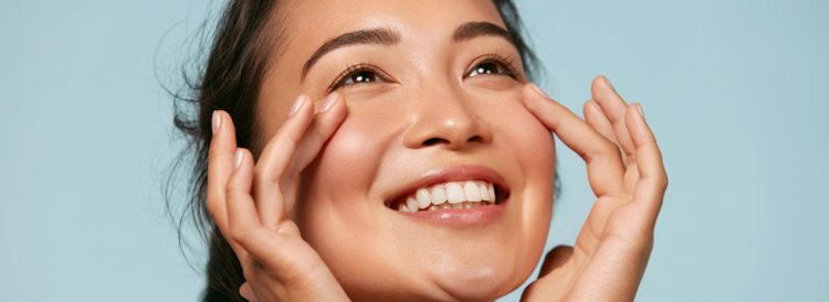 Close-up of a woman  with glowing skin, symbolising a spring skincare reset.